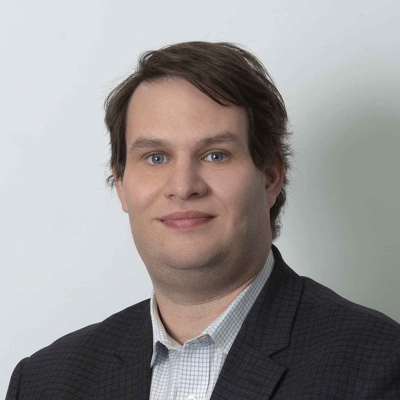 image-team-headshot-JSC-5157-min Adam Rosenblatt